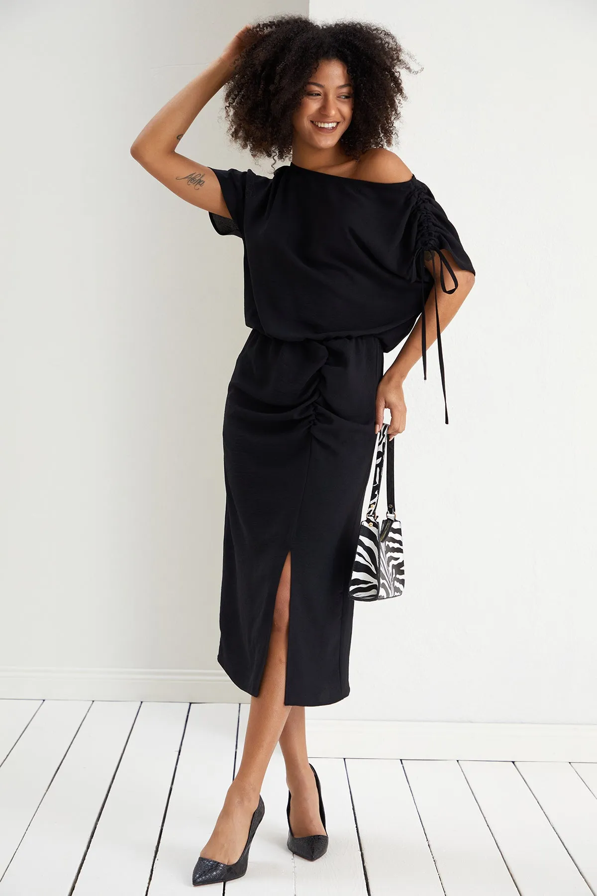 Draped Off-Shoulder Midi Dress in Elegant Black